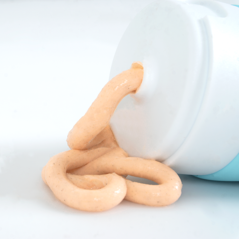 Exfoliating Face Scrub tube with scrub squeezed out